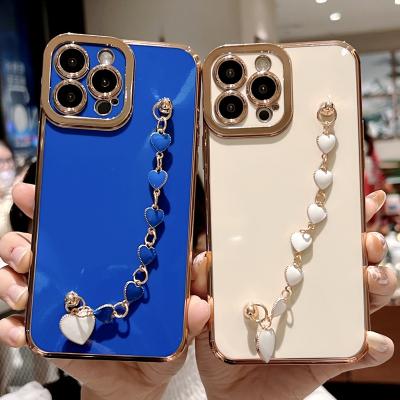 China Luxury Shockproof Candy Color Plating Love Heart Wrist Bracelets Chain Phone Case For iPhone 13 12 11 pro Max Fundas for sale