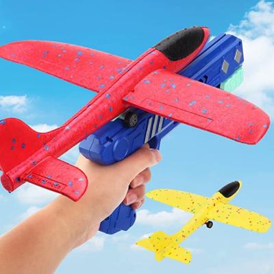 China Flat Shooter Toy Foam Airplane Launcher Toys Gun Glider Catapult Flat Toy for Kids Catapult Guns Airplanes Outdoor Shoot for sale