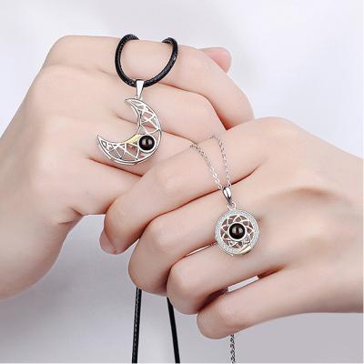 China Fashion Sun Moon Couple Magnetic Woven Magnetic Pendant Necklace Combination Couples Necklace for sale