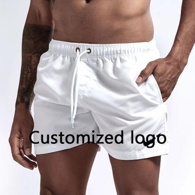 China QUICK DRY Custom Logo Men's Summer Quick Dry Beach Wear Swimming Shorts Swim Trunks for Men mens white shorts for sale