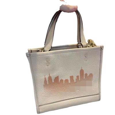 China New fashion women's handbag COC high-end luxury designer fashion high-end elegant women's bag simple and flexible shopping bag for sale