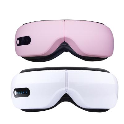 China Pink Handheld Air Pressure Vibration Digital Eye Massager For Eye Relief Heat Compress Eye Care Mask With Music for sale