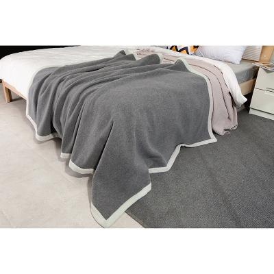 China Simple Wholesale Super Soft Knitted Blanket Polyester Throw Blanket For Sofa Chair Bed for sale