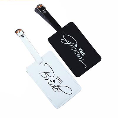 China Couple Eco - Friendly Personalized Black And White Luggage Tags Luxury Leather Luggage Tag for sale