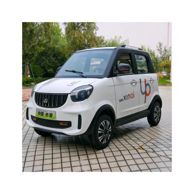 China Fabric 4 Seat Mini Electric Car Vehicle For Small Cheap Electric Adult for sale