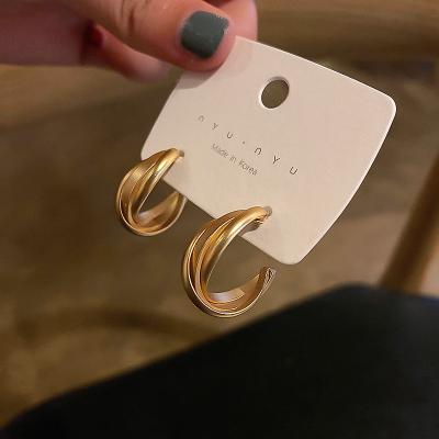 China New Trendy fashion gold metal earrings personality niche geometric twisted simple earrings for women 2021 for sale