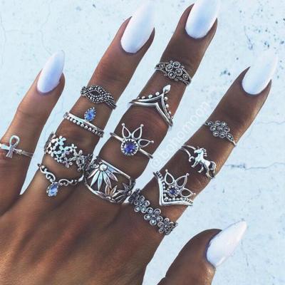 China Fashion Ring Set 13pcs/set Europe And The United States Carved Unicorn Lotus Hollow Diamond Rings Retro Setting for sale