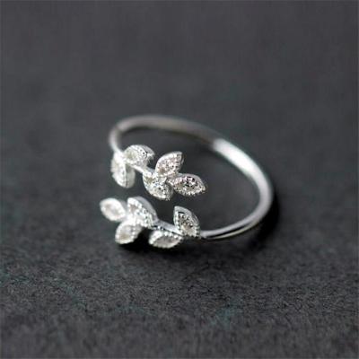 China 2021 FASHIONABLE small gold leaf opening jewelry rings women fashion simple opening silver tree of life leaf wedding rings for sale