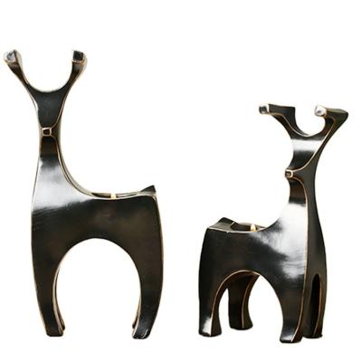 China Modern Simple American Resin Lucky Deer Tealight Candle Stick Europe Tea Candle Holder Holder for sale