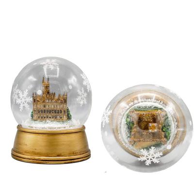 China Brand New Europe Polyresin Resin Opens Snow Globe Building Snow Globe Blowing Gift With High Quality for sale