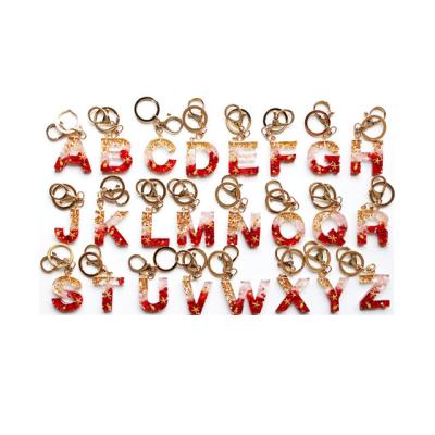 China Europe New Arrival Sequin Shiny Resin Initial Key Chain For Women Bulk Purse Charm Alphabet Key Ring Letter A-z Key Chain for sale