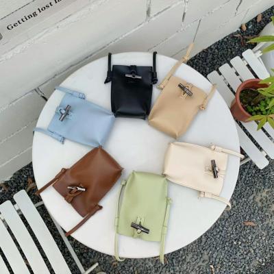 China 2022 Summer New Mini Vertical Mobile Phone Bag Fashion Soft Leather Coin Purse Shoulder Messenger Bag for sale