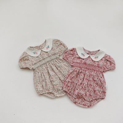 China Polyester/Cotton Summer Newborn Babies Rompers Bubble Floral Hand Made Flower Smocked Outfit Kids Clothing for sale