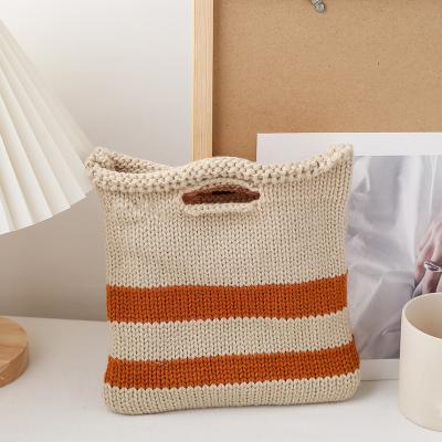 China Factory Custom Knitted Street Shooting Style Snack Bag For Girls Classic Fashion Tote Student Street Beat Style Bell Striped Bag for sale