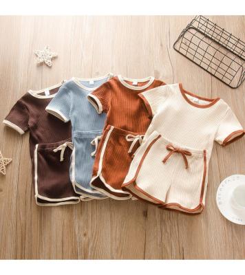 China Summer Knitted Casual Babies' Clothing Set Polyester Cotton Baby Clothing Sets Anti-Shrink for sale