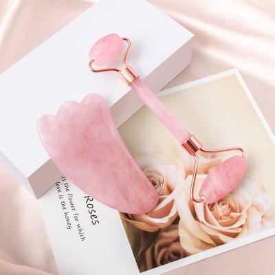 China Custom Rose quartz handle+pink quartz heads Amazon logo pink rose quartz guasha roller jade face roller for sale