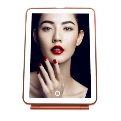 China Mini Touch Switch Pad Style Rechargeable Foldable Led Travel Use Portable Make Up Mirror With Led Light for sale