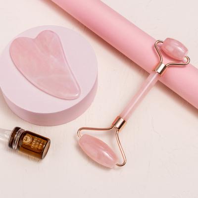 China Rose quartz handle+rose quartz heads jade anti aging facial roller crystal rose quartz guasha jade roller for face for sale