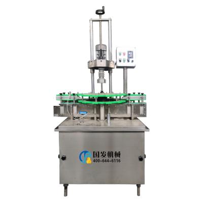 China Automatic Food Single Head Wine Bottle Aluminum Foil Cap Sealing Machine for sale