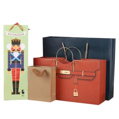 China Recycled materials customized custom logo big shopping maker making handle factories clothing cartoon texture low moq thin paper bags with ribbon for sale