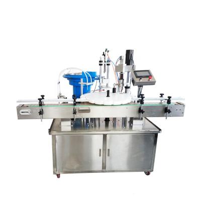 China YTK-AFC980 2 Food Lines Small Cosmetic Oil Bottle Production Line With Filling Capping And Labeling Disc for sale