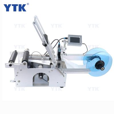 China YTK-TP1 Commercial Food Inkjet Digital Qr Coding Labeling Machine For Round Bottles For Business for sale