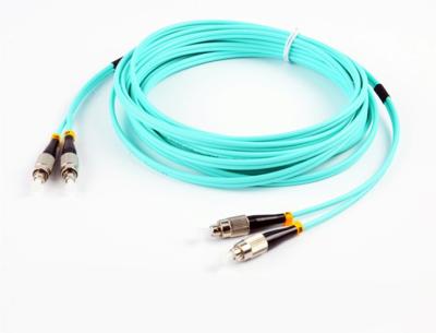 China OM3 la fibra del duplex FC/SC/ST/LC 50/125 seca los cables ópticos del remiendo de la fibra de los cordones 3.0/2.0m m del puente de la fibra del milímetro de los cordones en venta