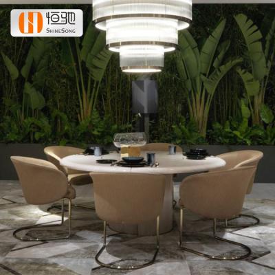 China (Other) Luxury Adjustable Stainless Steel Frame Marble Dining Table Set Modern White Round Dining Table for sale