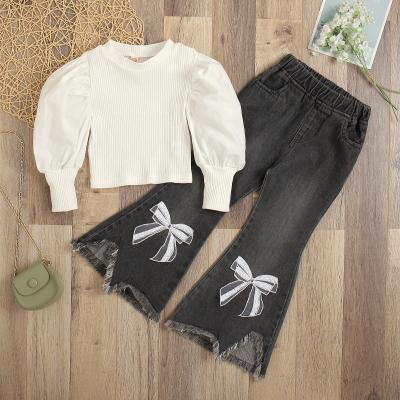 China Hot Selling Kids White Knitted Long Sleeve Bubble Top + Bow Casual 2 Piece Dark Gray Jeans Babies Fall Boutique Outfit Sets for sale