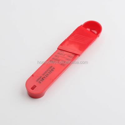 China Sustainable Adjustable Kitchen PP Doser With Plastic Scales Spoon Red for sale