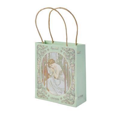 China Handmade Full Color Custom Printing Cardboard With New Arrival With Handle Single Elegant Folding Bag for sale