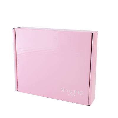 China Fashion Recyclable Cardboard Kraft Paper Packaging Pink Shipping Box For Clothes Packaging Box for sale