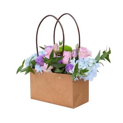 China Bouquet Florist Gift Packing Box Purse Flower Box Wrapping Paper Recyclable Waterproof Paper Bags Flower Box With Handle for sale