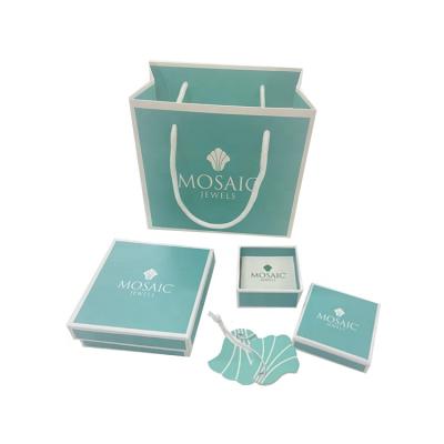 China Turquoise Logo Materials Small Fancy Design Jewelry Tag Jewelry Packaging Gift Box Recycled Paper Bag for sale