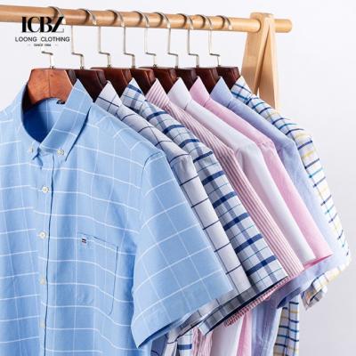 China 2023 Delivery Adult Large Size Cotton Oxford Short-Sleeved Plaid Casual Shirt for Men for sale