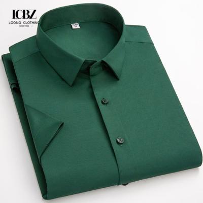 China Distribution High Elastic Men's Shirt in Large Size Solid Color Business Casual Shirt for sale