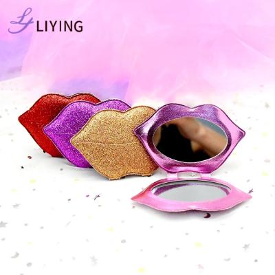 China Customized Enlargement Glitter Small Makeup Hand Mirrors Lip Shape Custom Compact Mini Mirror Gift for sale