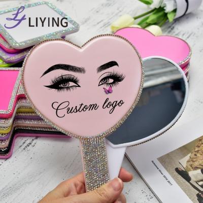 China Bling Diamond Rhinestone Custom Logo Makeup Hand Mirror Custom Heart Hand Held Mirror for Beauty Makeup for sale