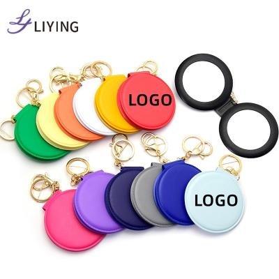 China Cheap Custom Key Chain Magnifying Mirror Logo Hand Portable Folding Cosmetic Round Compact Promotion Mirror Travel Pocket Mirror for sale