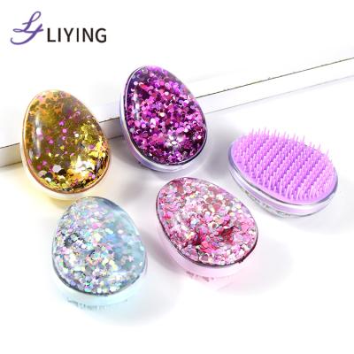 China Private Label Egg Shape Hair Brush Waterproof Pocket Moving Liquid Scalp Massager Hair Brush For Women for sale