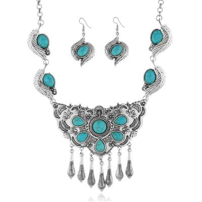 China Vintage Turquoise Chunky Carved Collar Necklace Earrings Bohemian Jewelry Set For Women for sale