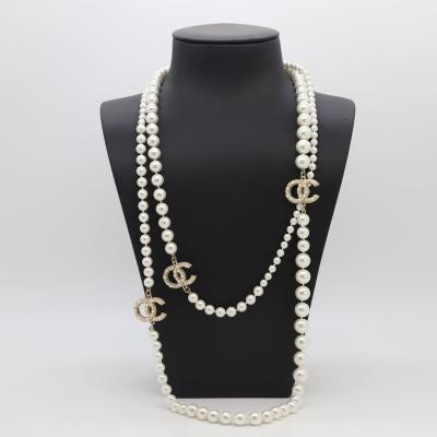 China Winter FASHIONABLE Wholesale Classic Pearl Sweater Chain Centennial Long Necklace for sale