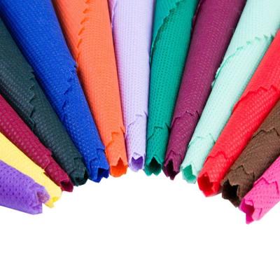 China [FACTORY] wholesale waterproof shopping bag raw material, TNT fabric, 100% colored polypropylene pp non woven fabric for sale