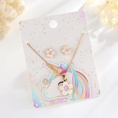 China FASHIONABLE wholesale creative 2022 children's jewelry sets Cartoon flower Unicorn Alloy Dripping kids necklace earring jewelri set for sale