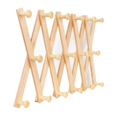 China CLASSIC Plant 17 Pegs X Form Solid Wood Accordion Wall Coat Hanger Wall Hat Rack for sale