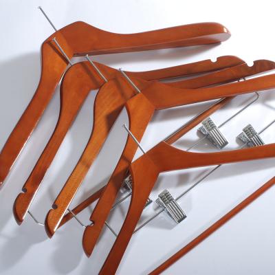 China China Country Factory Price Anti-thief Ring Cherry Wooden Hotel Hangers with Metal Clips for Pant Skirts for sale