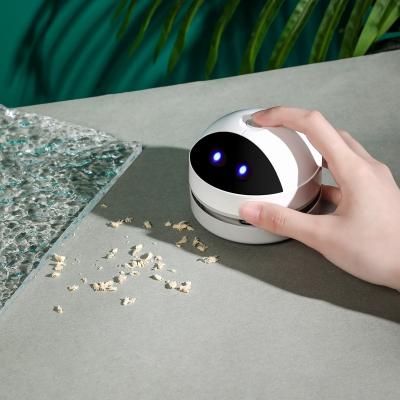 China Car Mini Table Sweeper Keyboard Dust Portable Smart Rechargeable Wholesale Cleaning Desktop Vacuum Cleaner for sale