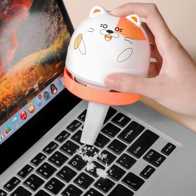 China Car Fashion Cartoon Design Mini Car Keyboard Table Sweeper Rechargeable Dust Cleaning Desktop Vacuum Cleaner for sale