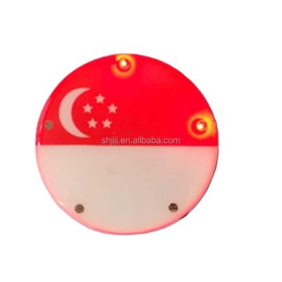 China Wholesale Fashion Nickel Free Led Design Tin Button Light Badges for sale