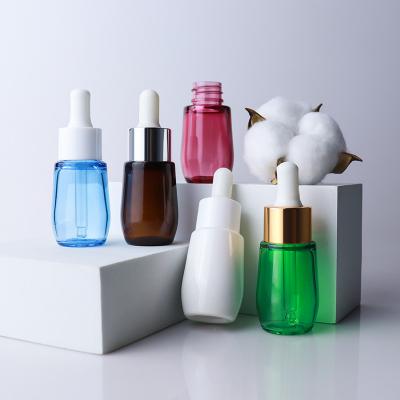 China Single Portable Clear Amber Sample Eye Dropper Plastic Empty Empty Face Serum Bottle With White Cap for sale